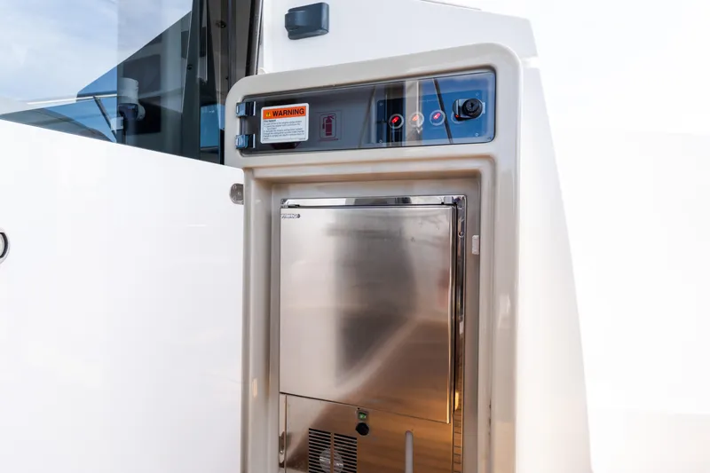 Slide: The Image of Control panel and storage on 2023 Azimut Fly 50 yacht. - 111