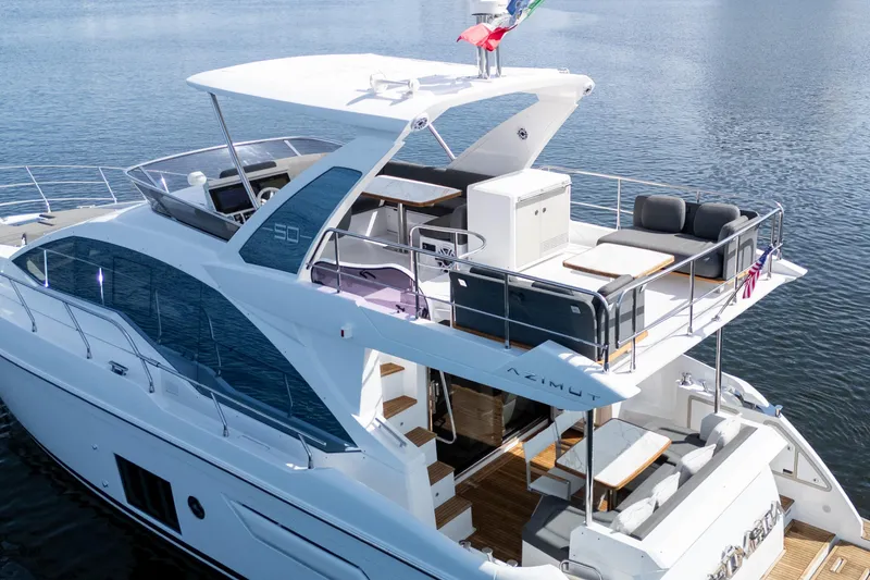 Slide: The Image of 2023 Azimut Fly 50 yacht with spacious deck and modern design on water. - 12