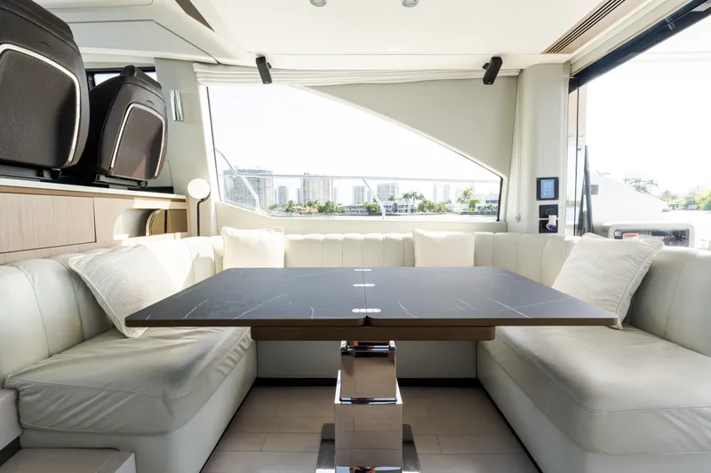 Slide: The Image of Luxurious interior of 2023 Azimut Fly 50 yacht with elegant seating and modern table. - 63