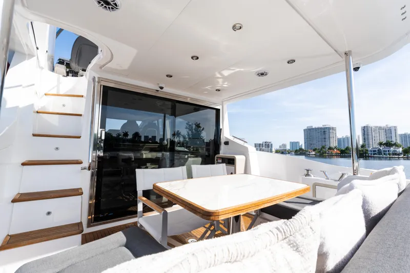 Slide: The Image of Luxurious 2023 Azimut Fly 50 yacht interior with elegant seating and scenic waterfront view. - 20