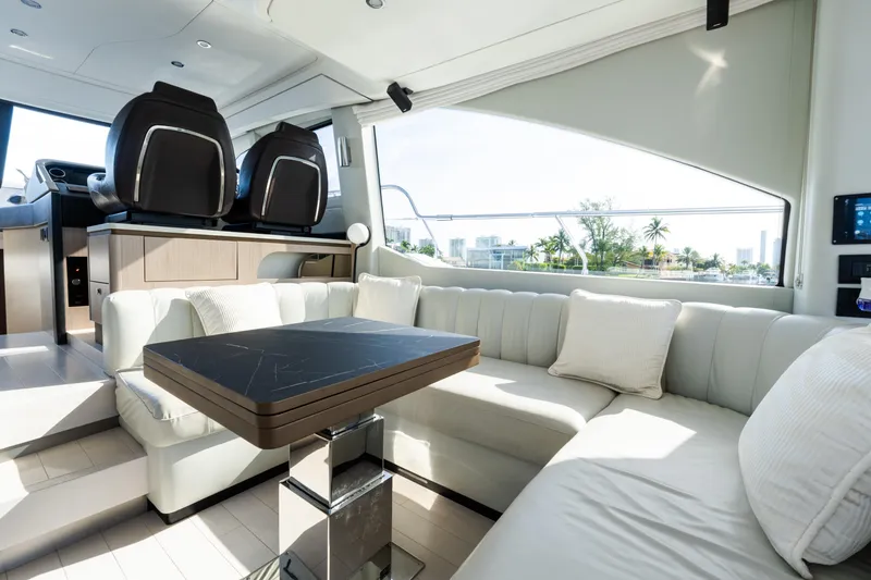 Slide: The Image of Luxurious interior of 2023 Azimut Fly 50 yacht with plush seating and modern design. - 61