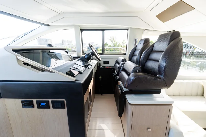 Slide: The Image of Luxurious interior of 2023 Azimut Fly 50 yacht with modern helm and leather seating. - 75