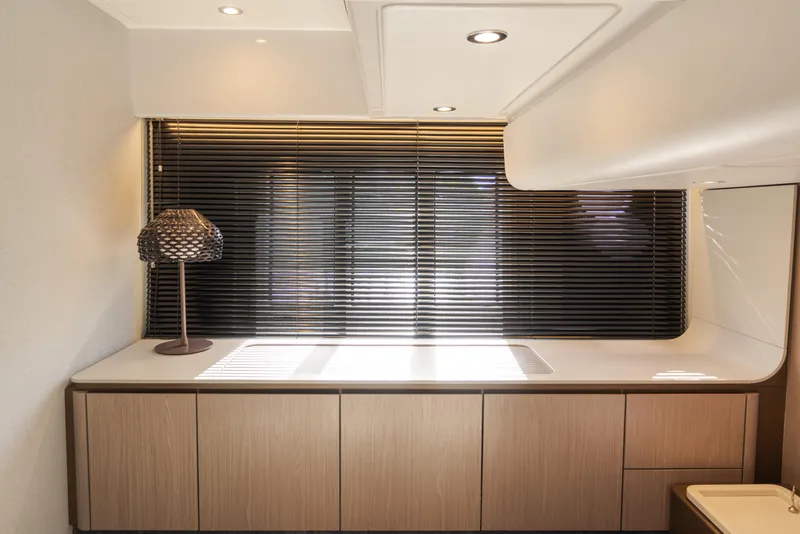 Slide: The Image of Modern interior of 2023 Azimut Fly 50 yacht with sleek cabinetry and stylish lamp. - 91