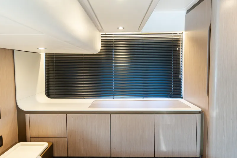 Slide: The Image of Modern interior of 2023 Azimut Fly 50 yacht with sleek cabinetry and blinds. - 92