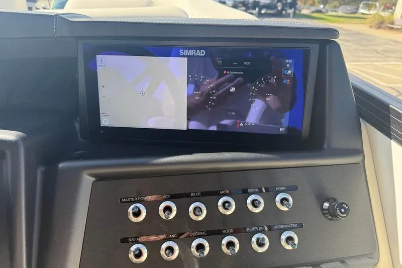 Slide: The Image of Alera M 25Q 2026 boat dashboard with Simrad display and control panel. - 13