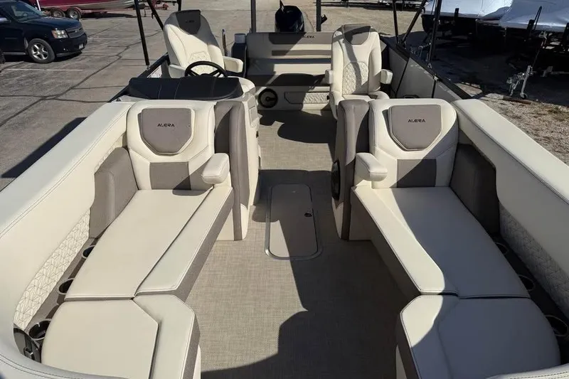 Slide: The Image of 2026 Alera M 25Q boat interior with luxurious seating and modern design. - 16