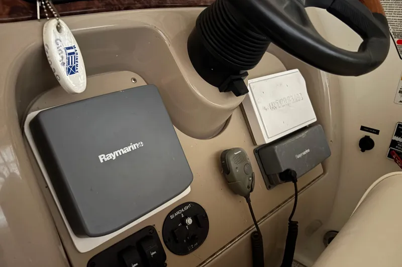 Slide: The Image of Control panel of a 2002 Sea Ray 260 Sundancer with Raymarine equipment. - 7