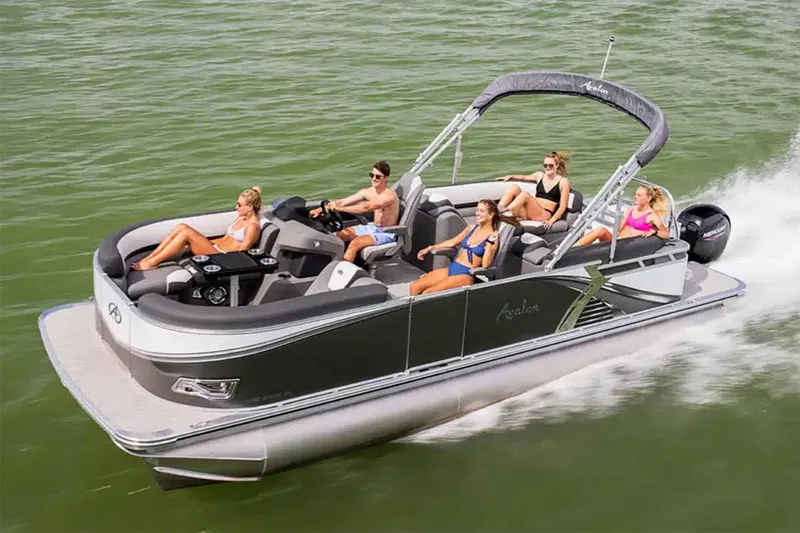 The Image of Manufacturer Provided Image: 2024 Avalon LSZ Quad Lounger pontoon boat cruising on the water with passengers. - 0