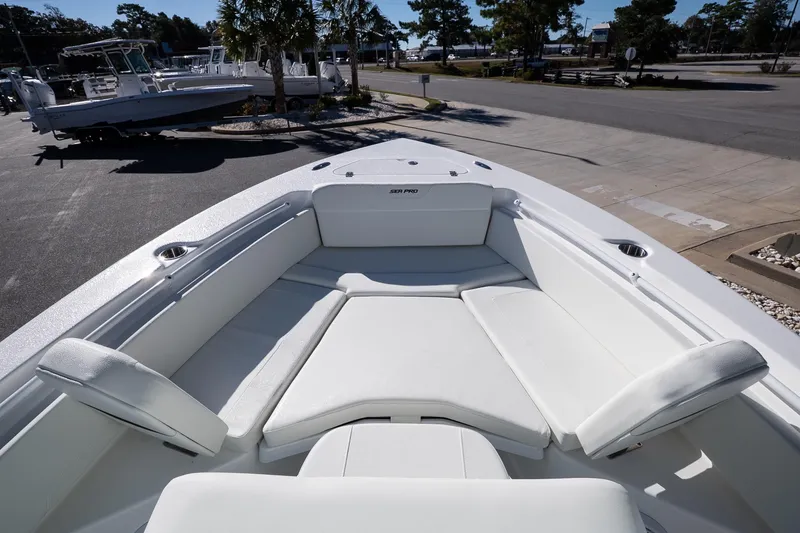 Slide: The Image of 2026 Sea Pro 225FLX Sandbar boat with spacious white seating area. - 15