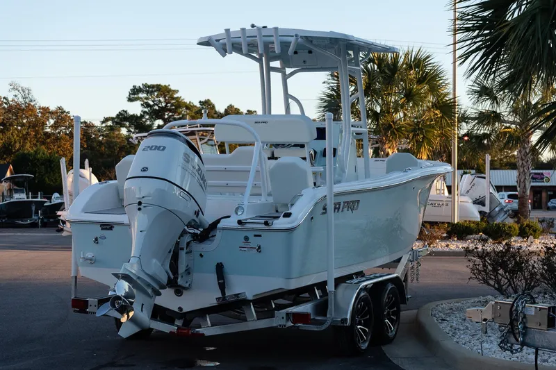 Slide: The Image of 2026 Sea Pro 225FLX Sandbar boat with Suzuki 200 engine on trailer. - 7