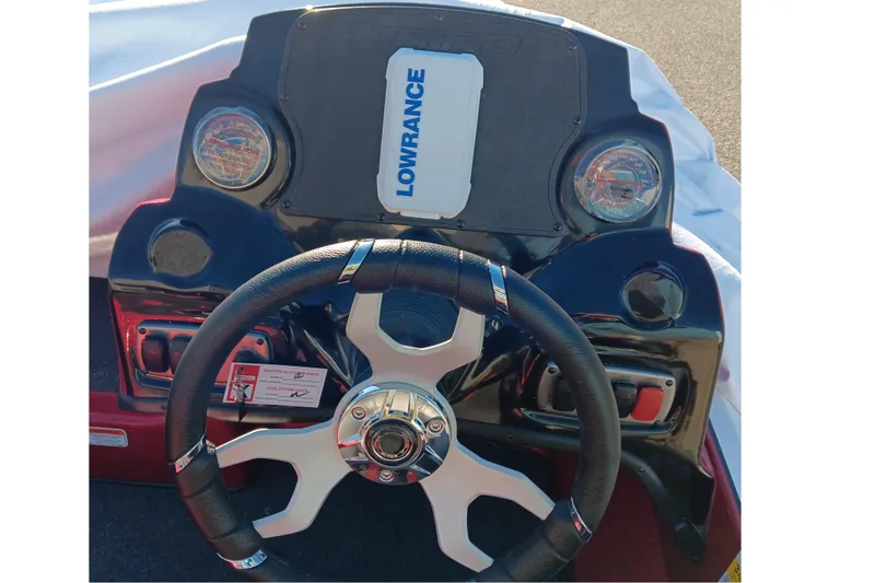 Slide: The Image of Steering wheel and dashboard of 2026 Nitro Z17 boat with Lowrance display. - 12