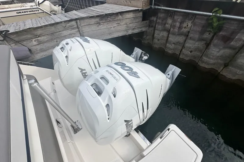 Slide: The Image of 2023 Tiara Yachts 34 LS with twin Mercury 400 outboard engines docked. - 9