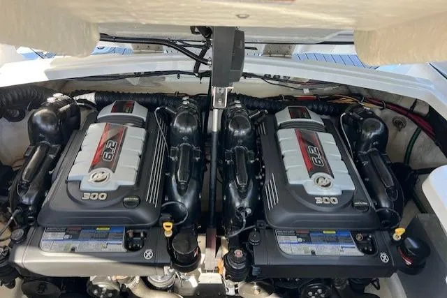 Slide: The Image of Twin engines of a 2017 Monterey 328SS Super Sport boat, showcasing 6.2L 300 horsepower. - 21