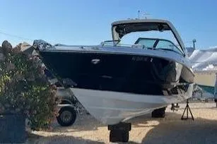 Slide: The Image of 2017 Monterey 328SS Super Sport boat displayed outdoors on a sunny day. - 3
