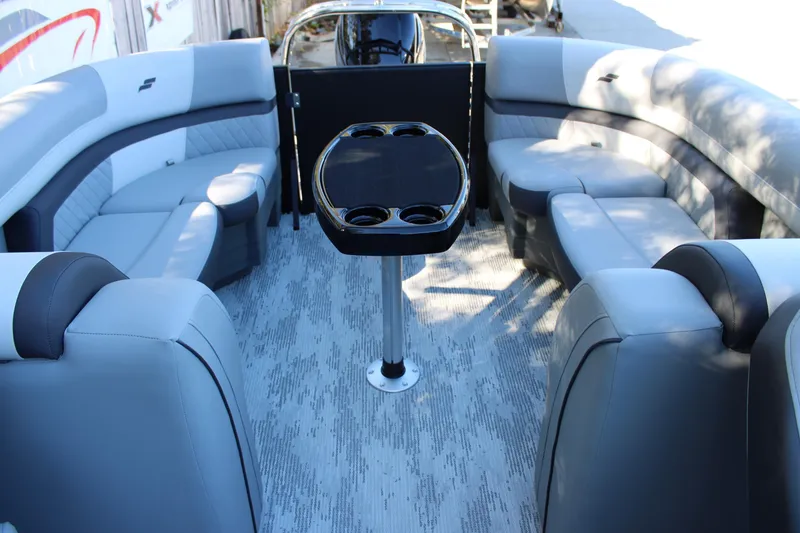Slide: The Image of Luxurious interior of 2026 Starcraft EXS 3 boat with plush seating and sleek table design. - 14