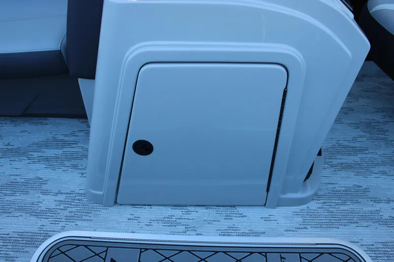 Slide: The Image of Starcraft EXS 3 2026 boat interior storage compartment with sleek design. - 25