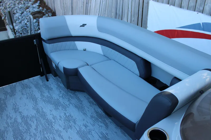Slide: The Image of 2026 Starcraft EXS 3 boat interior with sleek gray seating and modern design. - 27