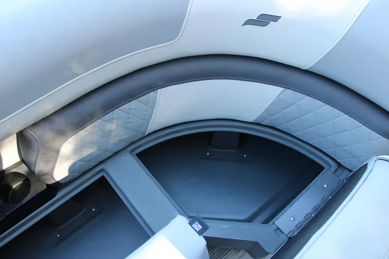 Slide: The Image of 2026 Starcraft EXS 3 interior with quilted upholstery and sleek design elements. - 33