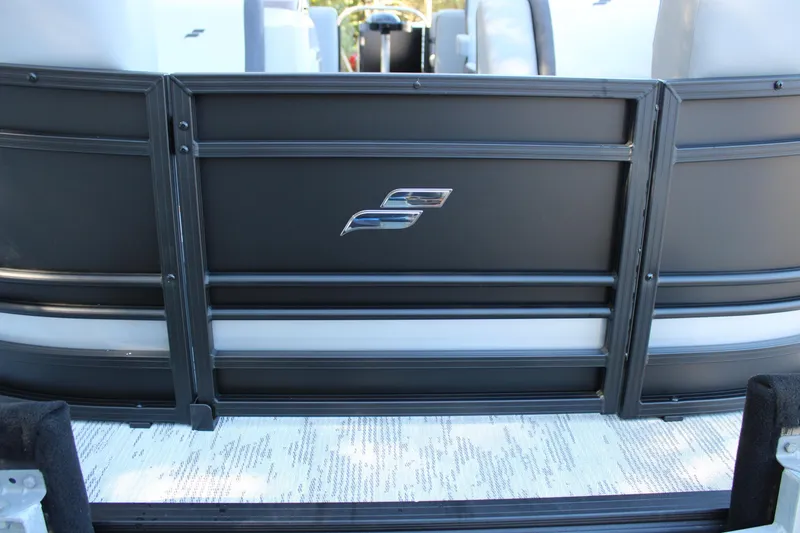 Slide: The Image of 2026 Starcraft EXS 3 boat with sleek black paneling and logo detail. - 35