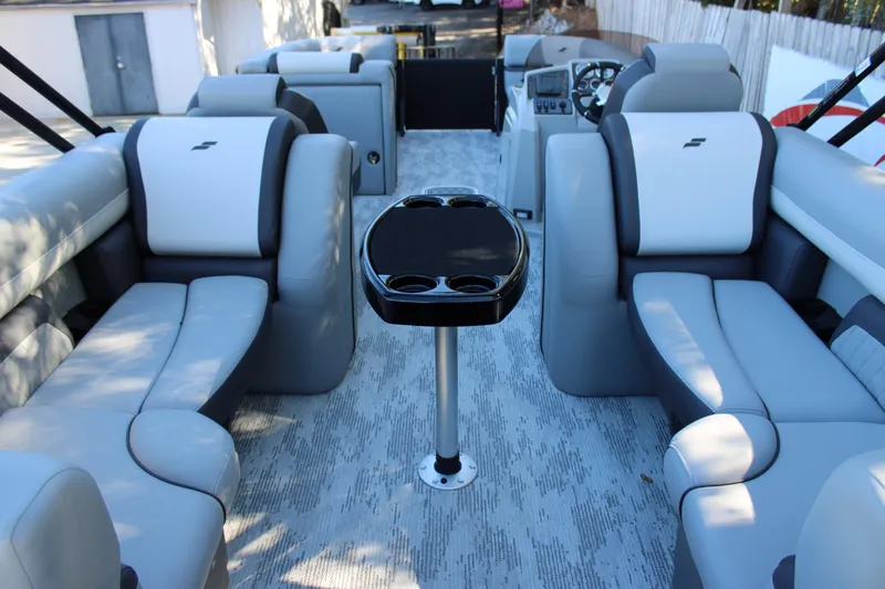 Slide: The Image of Interior of 2026 Starcraft EXS 3 boat with modern seating and table. - 9