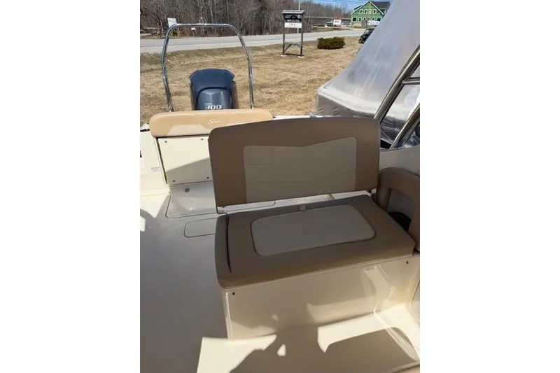 Slide: The Image of 2021 Scout 235 Dorado boat interior with seating and Yamaha 300 engine. - 7