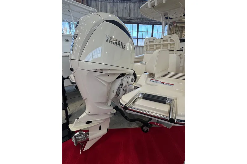 Slide: The Image of 2025 Grady-White Fisherman 216 with Yamaha outboard motor on display. - 13