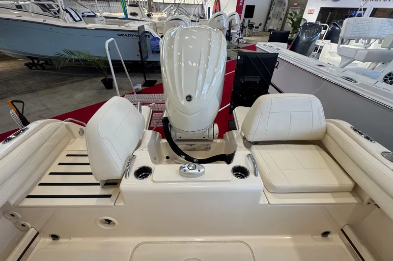 Slide: The Image of 2025 Grady-White Fisherman 216 boat interior with seating and engine view. - 4