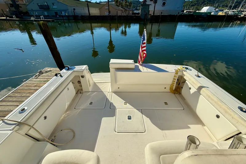 Slide: The Image of Compact shower area in 2005 Tiara 3600 Open yacht, featuring handheld showerhead and curtain. - 30