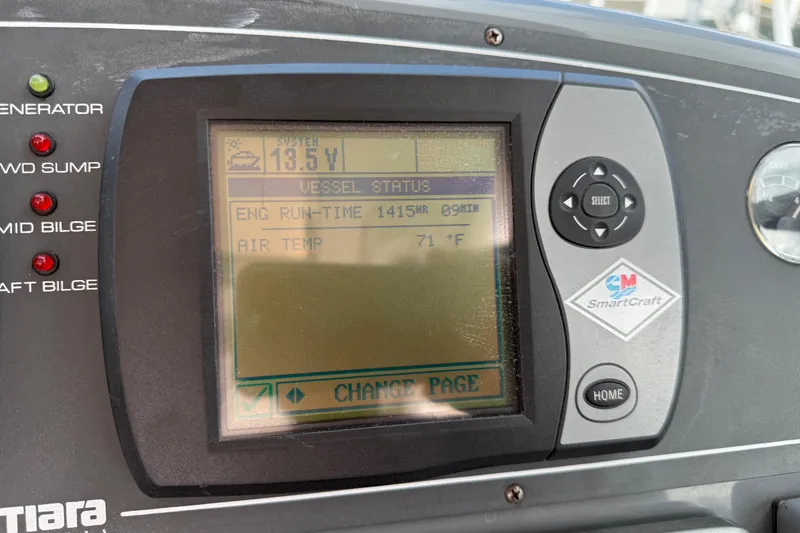 Slide: The Image of 2005 Tiara Yachts 3600 Open cruising on water, showcasing sleek design and spacious deck. - 8