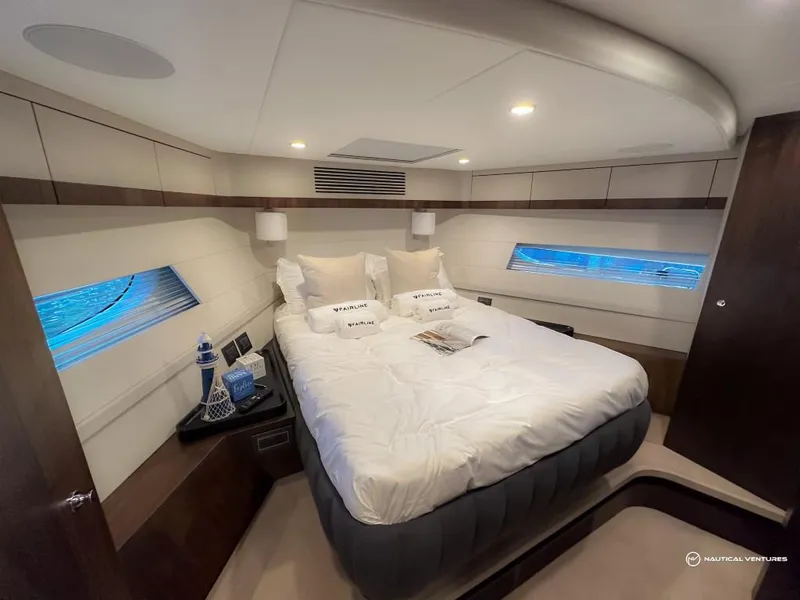 Slide: The Image of Luxurious bedroom interior of 2023 Fairline Phantom 65 yacht with modern design. - 46