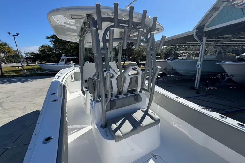 Slide: The Image of 2026 Cape Horn 32 XS boat interior with seating and rod holders. - 35