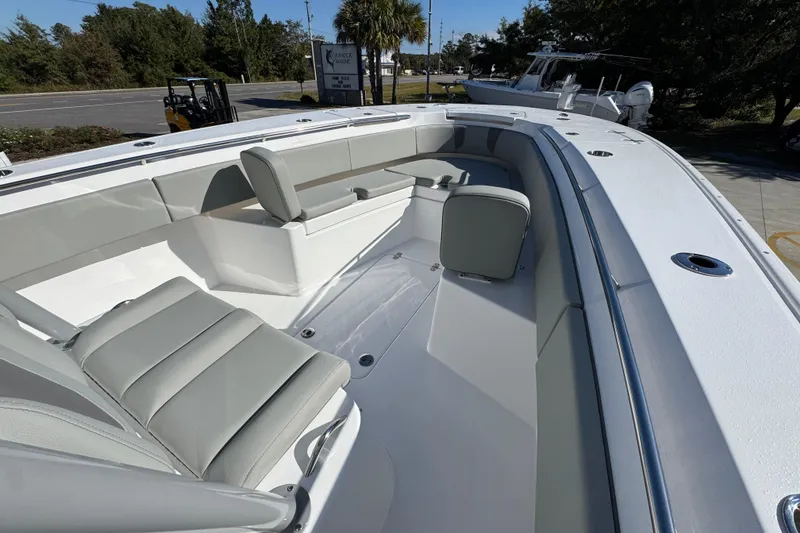 Slide: The Image of 2026 Cape Horn 32 XS boat interior with sleek seating and modern design. - 19