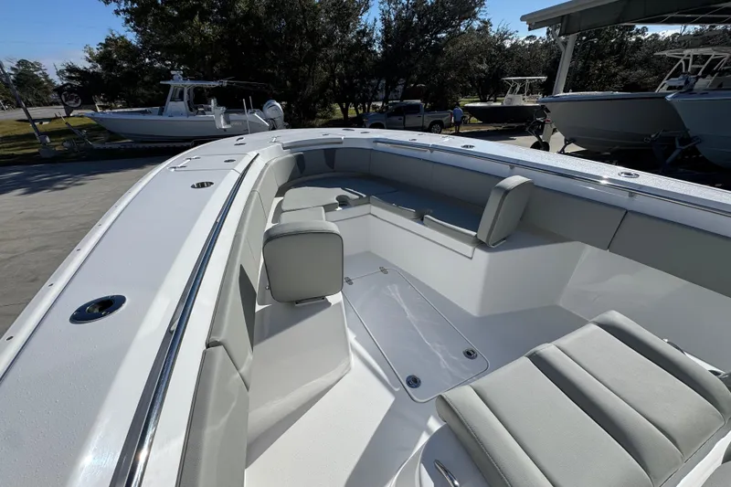 Slide: The Image of 2026 Cape Horn 32 XS boat interior with sleek seating and modern design. - 21