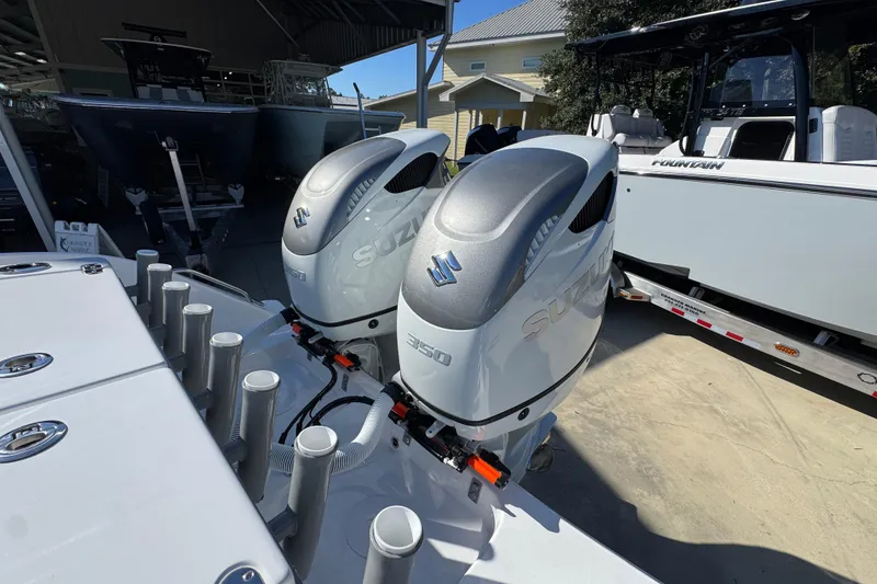 Slide: The Image of Twin Suzuki outboard engines on a 2026 Cape Horn 32 XS boat. - 40