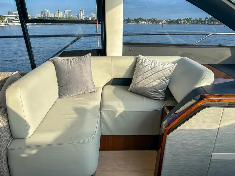 Slide: The Image of Fairline Squadron 68 2024 yacht interior with waterfront view. - 14