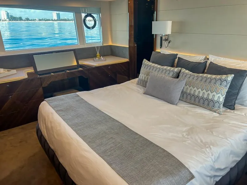 Slide: The Image of Luxurious bedroom interior of 2024 Fairline Squadron 68 yacht with ocean view. - 21