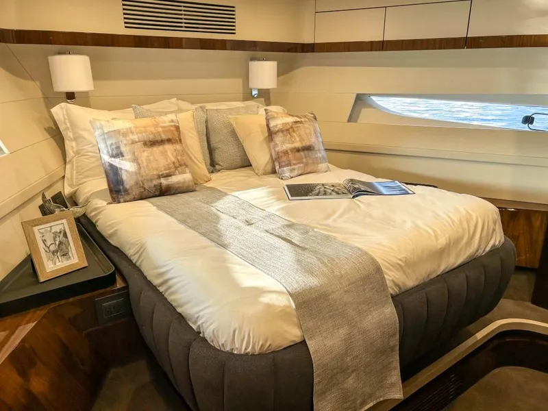 Slide: The Image of Luxurious bedroom interior of 2024 Fairline Squadron 68 yacht with elegant bedding and modern decor. - 28