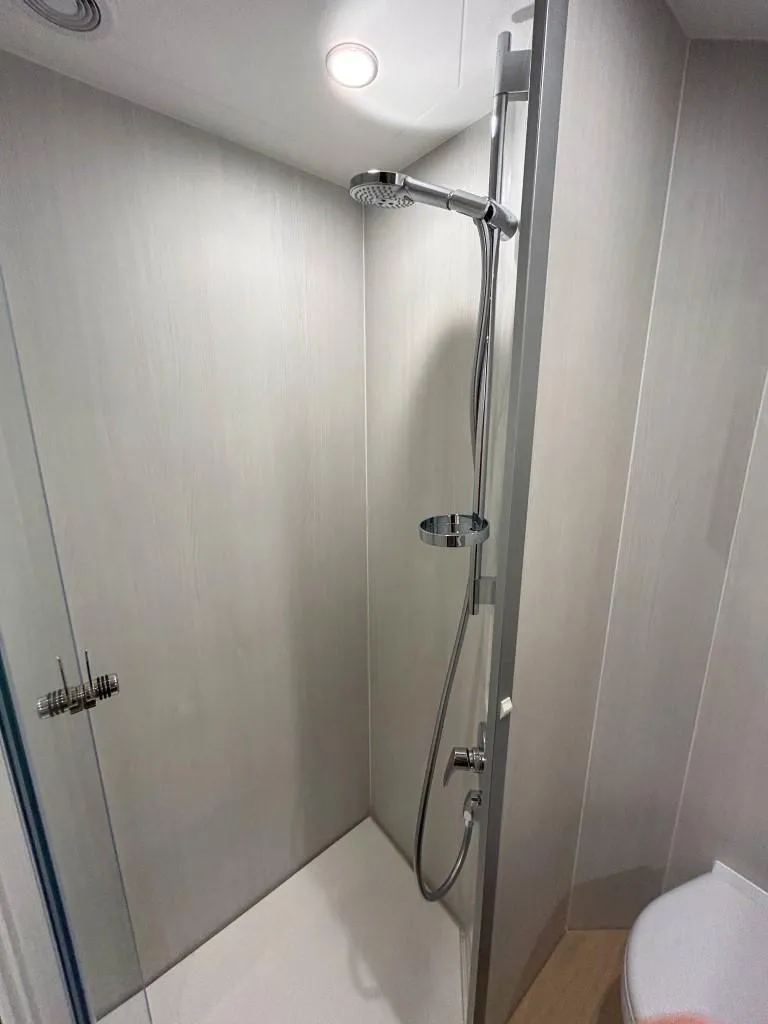 Slide: The Image of Modern shower area in 2024 Fairline Squadron 68 yacht bathroom. - 35