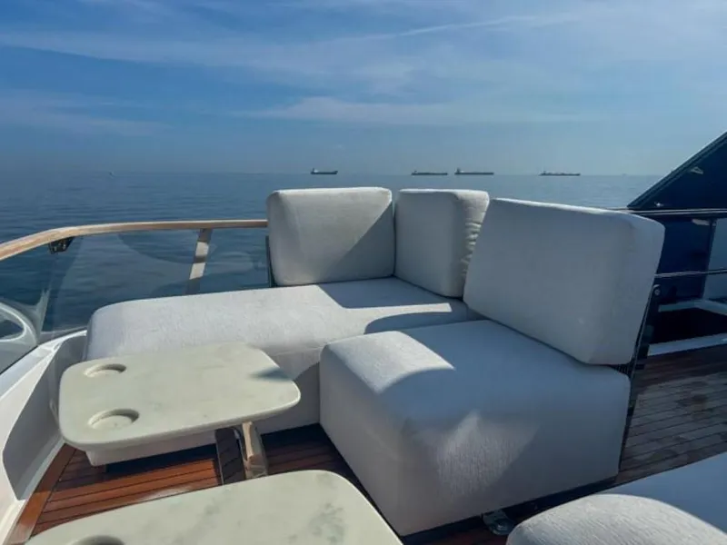 Slide: The Image of Luxurious seating area on the 2024 Fairline Squadron 68 yacht. - 45