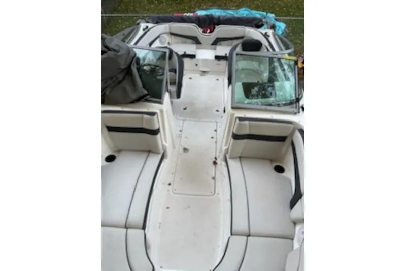 Slide: The Image of 2015 Yamaha Boats SX210 interior with seating and open deck layout. - 8