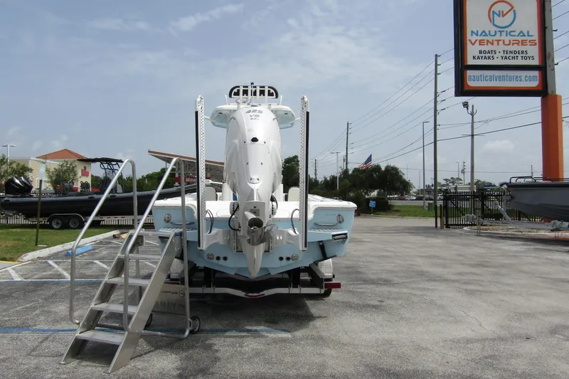 Slide: The Image of 2021 Tidewater 2700 Carolina Bay boat displayed at Nautical Ventures dealership. - 2