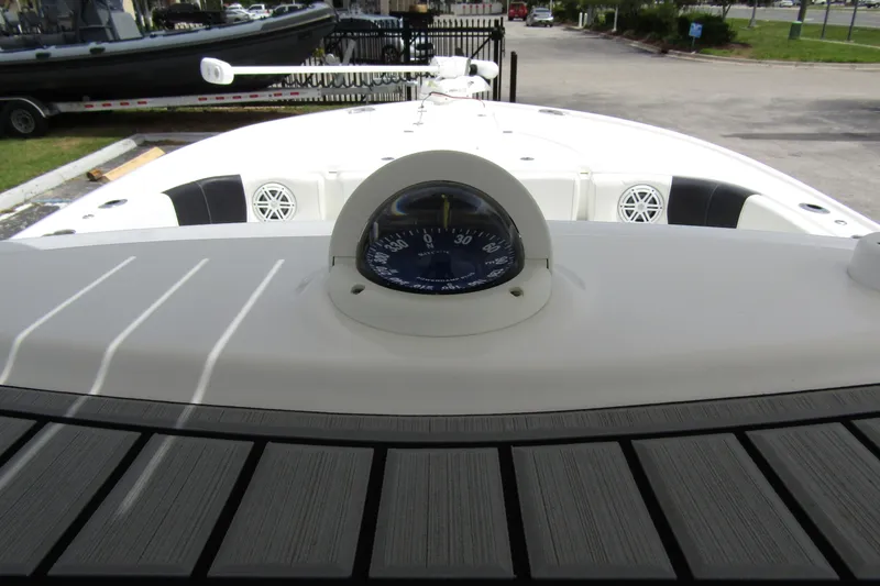 Slide: The Image of 2021 Tidewater 2700 Carolina Bay boat with compass and deck view. - 22