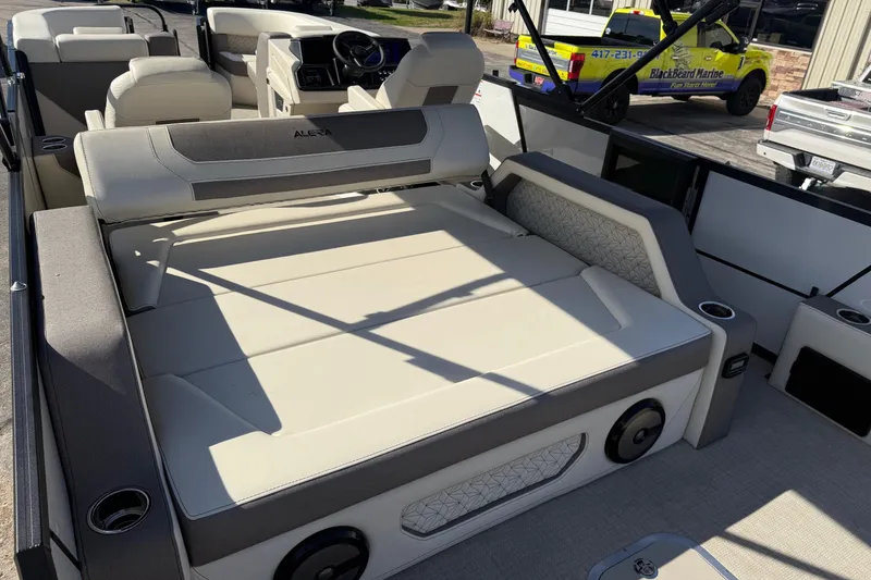 Slide: The Image of Luxurious seating area on 2026 Alera M 25L boat, featuring modern design and comfort. - 10