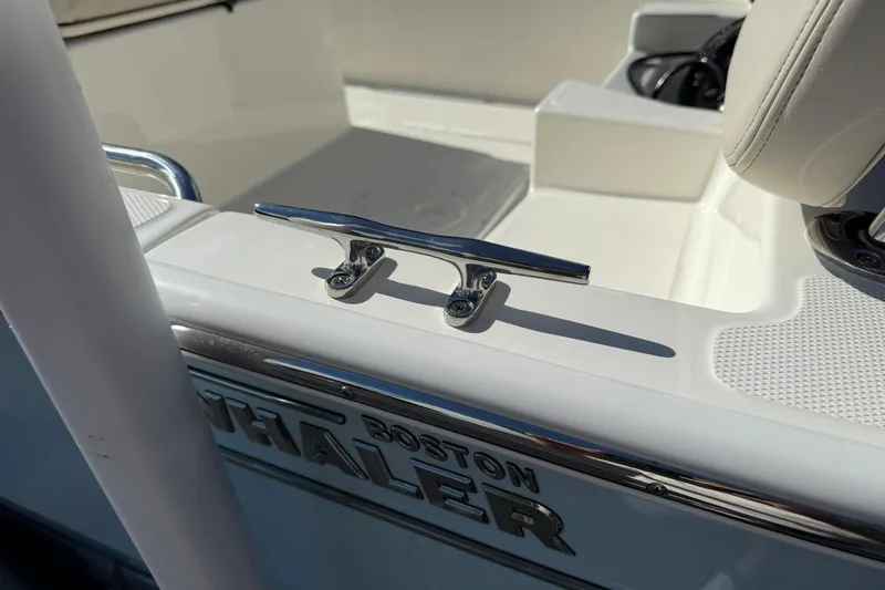 Slide: The Image of 2025 Boston Whaler 170 Montauk boat detail with cleat and seating. - 19