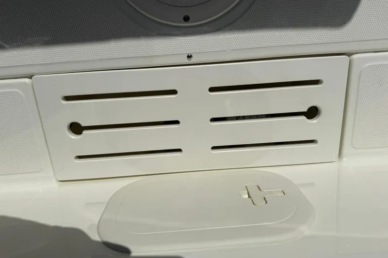 Slide: The Image of 2025 Boston Whaler 170 Montauk boat interior detail with white panel and hatch. - 29