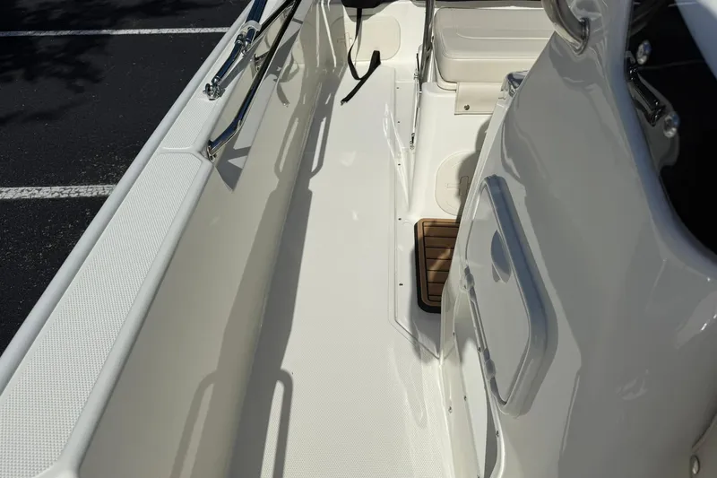 Slide: The Image of 2025 Boston Whaler 170 Montauk interior, showcasing sleek design and spacious layout. - 46