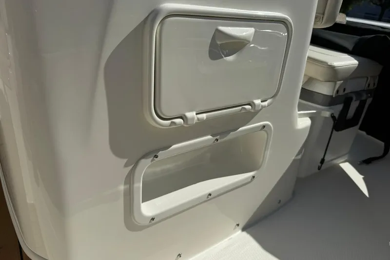 Slide: The Image of 2025 Boston Whaler 170 Montauk boat interior storage compartment detail. - 47