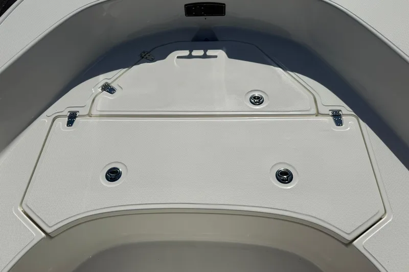 Slide: The Image of 2025 Boston Whaler 170 Montauk boat deck with storage compartments. - 52