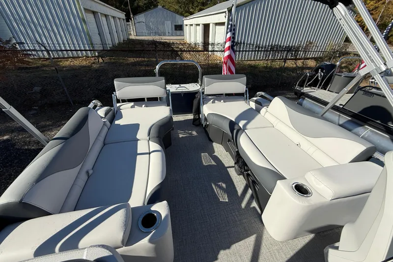 Slide: The Image of 2026 Tahoe Pontoon LTZ Quad Lounger Shift with spacious seating and modern design. - 2