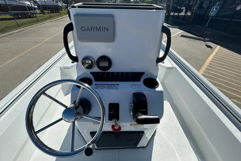 Slide: The Image of Steering console of 2026 Avid 21 Recon ST boat with Garmin navigation system. - 11